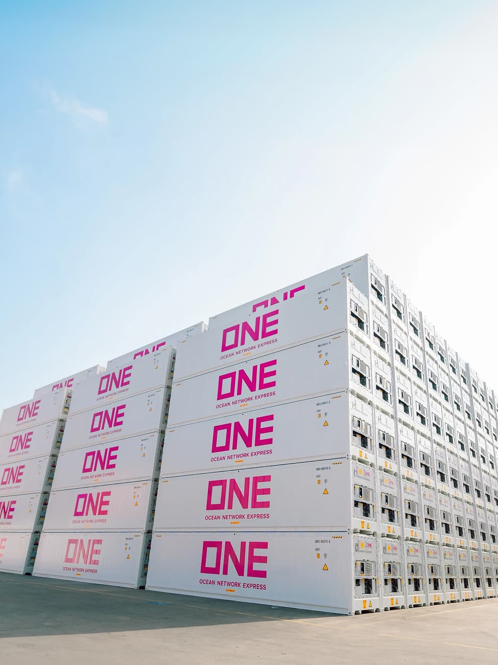 Reefer containers neatly stacked as part of a shipping transport solutions